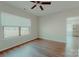 Bright living space featuring wood floors and a large window at 945 3Rd Street Sw Pl, Hickory, NC 28602