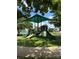 Community playground features a colorful playset with slides, climbing structures, and a soft, safe play surface at 10133 Caldwell Forest Rd, Charlotte, NC 28213