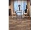 Charming dining area features rustic table, chairs, and decor with light and airy curtains at 119 Jack Adams Rd, Kings Mountain, NC 28086