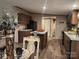Well-lit kitchen with wood cabinets, center island, and modern appliances creating a cozy atmosphere at 119 Jack Adams Rd, Kings Mountain, NC 28086
