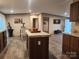 Open kitchen with central island, flowing into adjacent dining and living areas at 119 Jack Adams Rd, Kings Mountain, NC 28086