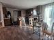 Cozy kitchen with dark wood cabinets, an island, and lots of natural light at 119 Jack Adams Rd, Kings Mountain, NC 28086