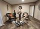 Cozy living room featuring stylish decor, wicker chairs and hardwood floors at 119 Jack Adams Rd, Kings Mountain, NC 28086