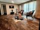 Inviting living room with decorative rug, cozy seating, and ample natural light at 119 Jack Adams Rd, Kings Mountain, NC 28086