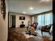 Inviting living room with decorative rug, cozy seating, and ample natural light at 119 Jack Adams Rd, Kings Mountain, NC 28086