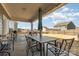 Spacious backyard patio with an outdoor dining set and string lights, perfect for entertaining at 123 Clauser N Rd, Mount Holly, NC 28120