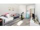 Comfortable bedroom featuring a daybed, exercise bike and mini fridge at 123 Clauser N Rd, Mount Holly, NC 28120