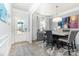 Elegant dining room with modern light fixture, stylish table, and decor at 123 Clauser N Rd, Mount Holly, NC 28120