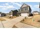 Two-story home with a manicured lawn, two-car garage, and inviting curb appeal at 123 Clauser N Rd, Mount Holly, NC 28120