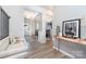 Inviting foyer boasts neutral walls, light hardwood floors, and access to a formal dining area and comfortable seating at 123 Clauser N Rd, Mount Holly, NC 28120