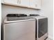 Laundry room featuring modern, stainless steel washer and dryer appliances at 123 Clauser N Rd, Mount Holly, NC 28120