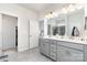 Bright main bathroom featuring a double sink vanity and a glass shower at 123 Clauser N Rd, Mount Holly, NC 28120