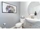 Chic powder room with gray walls, modern fixtures, and stylish decor at 123 Clauser N Rd, Mount Holly, NC 28120