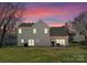 Charming home backyard with a well-maintained lawn and a cozy patio area perfect for outdoor entertaining at 123 Southhaven Dr, Mooresville, NC 28117