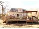 Spacious backyard deck with wooden railings, ideal for outdoor dining and relaxation at 1256 Twin Lakes Rd, Rock Hill, SC 29732