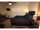 This bedroom has neutral-colored walls and carpet, as well as a ceiling fan and comfortable furnishings at 1256 Twin Lakes Rd, Rock Hill, SC 29732