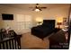 This bedroom has neutral-colored walls and carpet, as well as a ceiling fan and comfortable furnishings at 1256 Twin Lakes Rd, Rock Hill, SC 29732