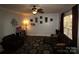 Comfortable living room with a plush sofa, warm wood floors, and decorative accents at 1256 Twin Lakes Rd, Rock Hill, SC 29732