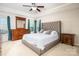 Comfortable main bedroom featuring neutral walls, lots of natural light, and soft textures at 128 Millen Dr, Mooresville, NC 28115