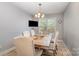 Bright dining area with a view to the window and modern chandelier at 151 Birkdale Dr, Salisbury, NC 28144