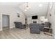 Spacious living room with vaulted ceilings, fireplace, and wood-look flooring at 151 Birkdale Dr, Salisbury, NC 28144