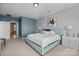 Bright bedroom with a large bed, night stands, and a walk-in bathroom at 15138 Callow Forest Dr, Charlotte, NC 28273