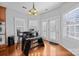 Bright dining area featuring a modern table set with french doors to the outside at 15138 Callow Forest Dr, Charlotte, NC 28273