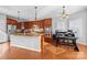 Spacious kitchen with stainless steel appliances, large island and dining area with natural light at 15138 Callow Forest Dr, Charlotte, NC 28273