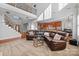 Spacious living room with high ceilings, a staircase, and a cozy seating area at 15138 Callow Forest Dr, Charlotte, NC 28273