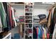 Walk-in closet featuring ample storage space with organized shelves and hanging rods for clothing at 1514 Ring Tail Rd, Claremont, NC 28610