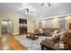 Spacious living room featuring a fireplace, plush seating, and hardwood floors at 1514 Ring Tail Rd, Claremont, NC 28610