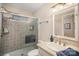 Bathroom with a vanity, mirror, drawers, toilet and a shower with glass doors at 15920 Fieldstone Dr, Matthews, NC 28104