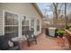 Relax on the deck with outdoor seating, a grill, and a lush backyard view at 15920 Fieldstone Dr, Matthews, NC 28104