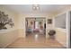 Elegant dining room showcasing hardwood floors and a glimpse into the inviting living room at 15920 Fieldstone Dr, Matthews, NC 28104
