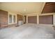 Spacious garage with room for vehicles and storage at 15920 Fieldstone Dr, Matthews, NC 28104