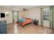 Serene main bedroom with hardwood floors, ample natural light, and comfortable furnishings for relaxation at 15920 Fieldstone Dr, Matthews, NC 28104