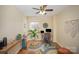 Bright office space offering hardwood floors, natural light, and a cozy work-from-home setup at 15920 Fieldstone Dr, Matthews, NC 28104