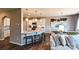 Bright kitchen with a granite countertop island, stainless appliances, and a dining space at 1766 Loggerhead Dr, Lancaster, SC 29720