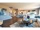Spacious living area featuring hardwood floors, neutral wall color and modern decor throughout at 1766 Loggerhead Dr, Lancaster, SC 29720