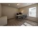 Well-lit home office with neutral carpet, a desk, and ample space for work at 1766 Loggerhead Dr, Lancaster, SC 29720