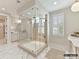 Luxurious bathroom with glass-enclosed shower, elegant fixtures, and modern design for ultimate relaxation at 2013 Garden View Ln, Weddington, NC 28104