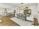 Open-concept layout featuring a dining room and kitchen with sleek appliances, perfect for modern living at 2013 Garden View Ln, Weddington, NC 28104