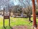 Carolina Thread Trail sign and park view showcasing recreational green space at 207 Oak Dr, Belmont, NC 28012