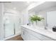 Contemporary bathroom featuring a double sink vanity and a modern glass-enclosed shower at 2319 Riggs Rd, Sherrills Ford, NC 28673