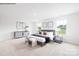 Spacious bedroom with soft carpet, a comfortable bed, and natural light from windows at 2319 Riggs Rd, Sherrills Ford, NC 28673