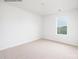 Bedroom with neutral carpet and window at 2319 Riggs Rd, Sherrills Ford, NC 28673