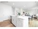 Kitchen with island and modern finishes open to living area at 2319 Riggs Rd, Sherrills Ford, NC 28673