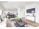 Open-concept living space combining living, dining, and kitchen areas for modern living at 2319 Riggs Rd, Sherrills Ford, NC 28673