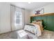 Bedroom with natural light, a buffalo themed print, and a decorative blanket and accent pillows at 260 Charlie Stacks Rd, Lancaster, SC 29720