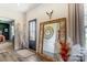 Chic entryway features sleek flooring, decor accents, and a large decorative mirror at 260 Charlie Stacks Rd, Lancaster, SC 29720